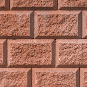 Blocco Muricciolo Terra di Impruneta con finitura rustica e colore caldo, caratterizzato da una texture tridimensionale simile a mattoni incastonati. Ideale per muri di contenimento e arredi urbani.