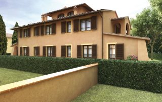 Villa con facciata color terra e persiane in legno scuro.